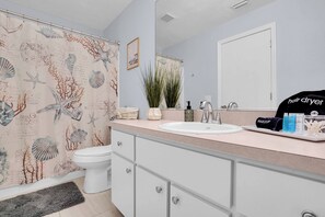 Hair dryer, towels, soap, shampoo
