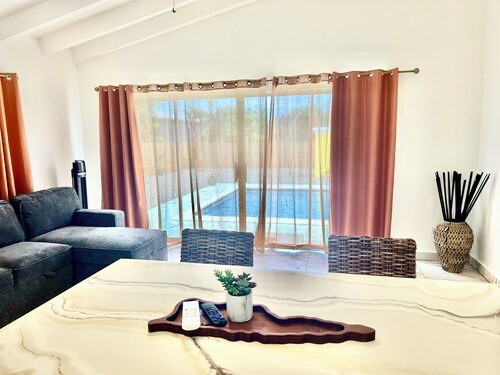 Escape to this modern home w/ a pool!