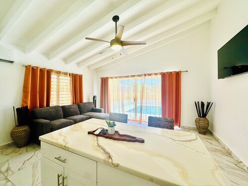 Escape to this modern home w/ a pool!