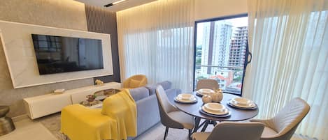 Exclusive Apartment | Living area | Flat-screen TV