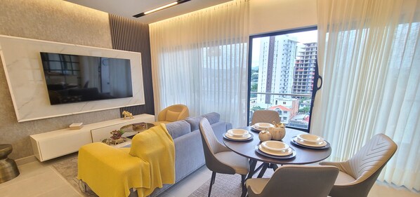 Exclusive Apartment | Living area | Flat-screen TV