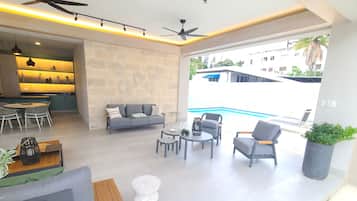 Exclusive Apartment | Living area | Flat-screen TV
