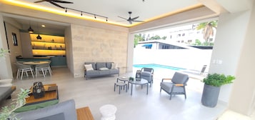 Exclusive Apartment | Living area | Flat-screen TV