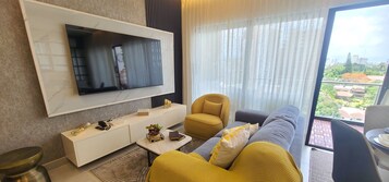 Exclusive Apartment | Living area | Flat-screen TV