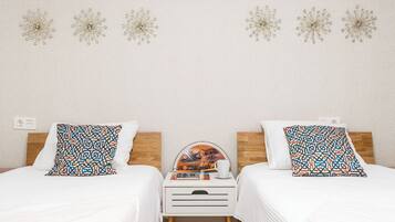 3 dormitorios, tabla de planchar con plancha, wifi gratis y ropa de cama