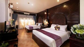 Family Quadruple Room, City View | Premium bedding, individually decorated, individually furnished, desk