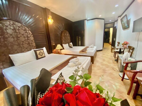 Family Quadruple Room, City View | Premium bedding, individually decorated, individually furnished, desk