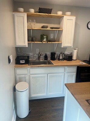 Fridge, microwave, cookware/dishes/utensils