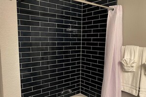 Shower, hair dryer, shampoo