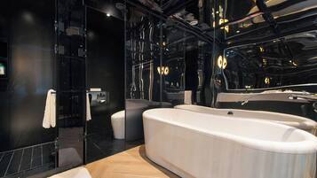 Premium bedding, down duvets, memory-foam beds, free minibar