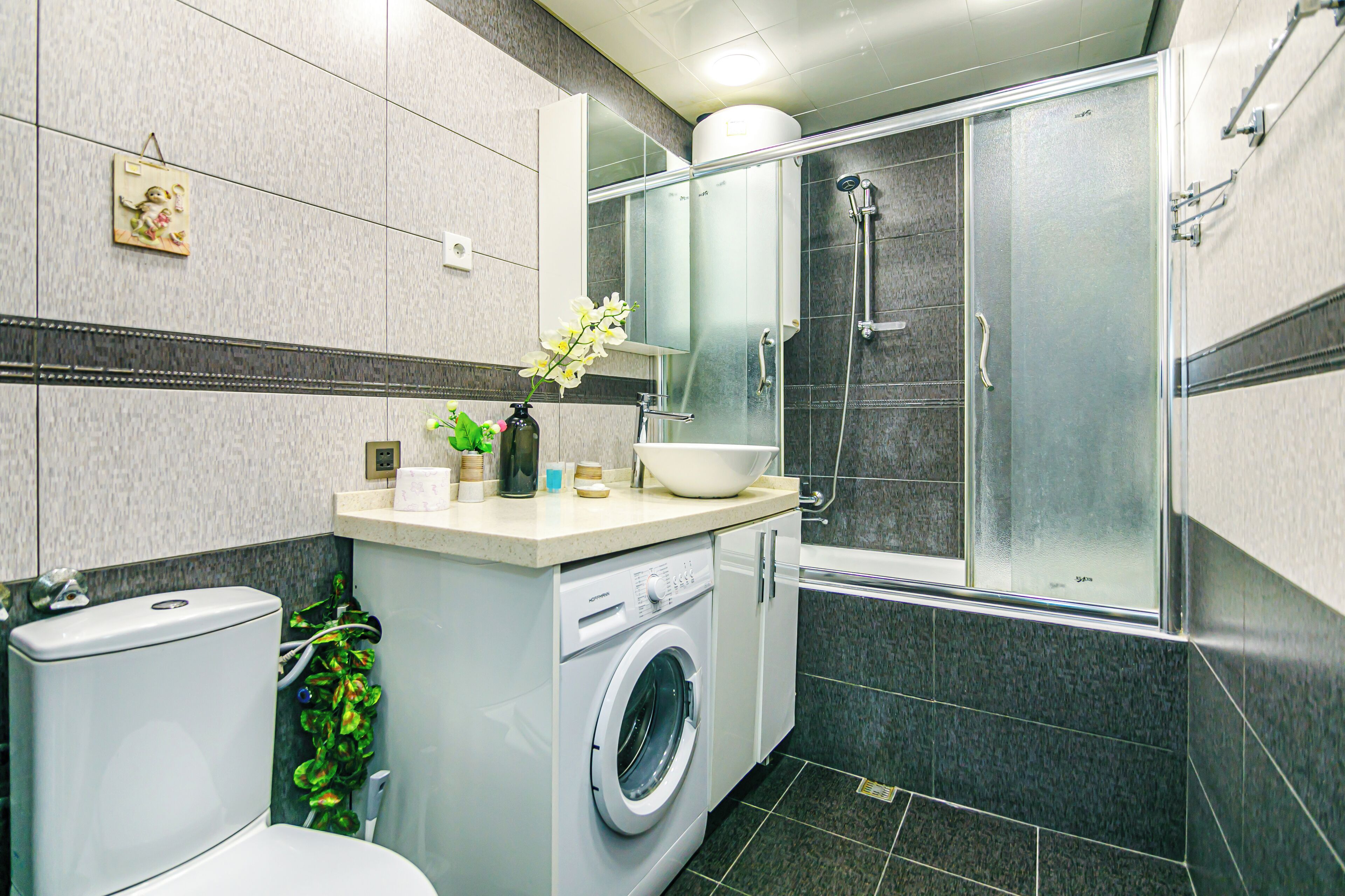Apartamento Deluxe, balcón, vistas a la ciudad | Baño | Zapatillas