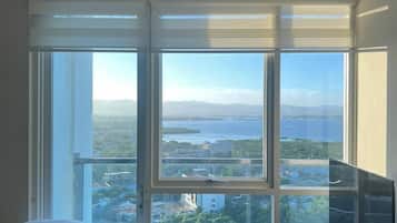 Panoramic Condo, Balcony, Beach View | Living area