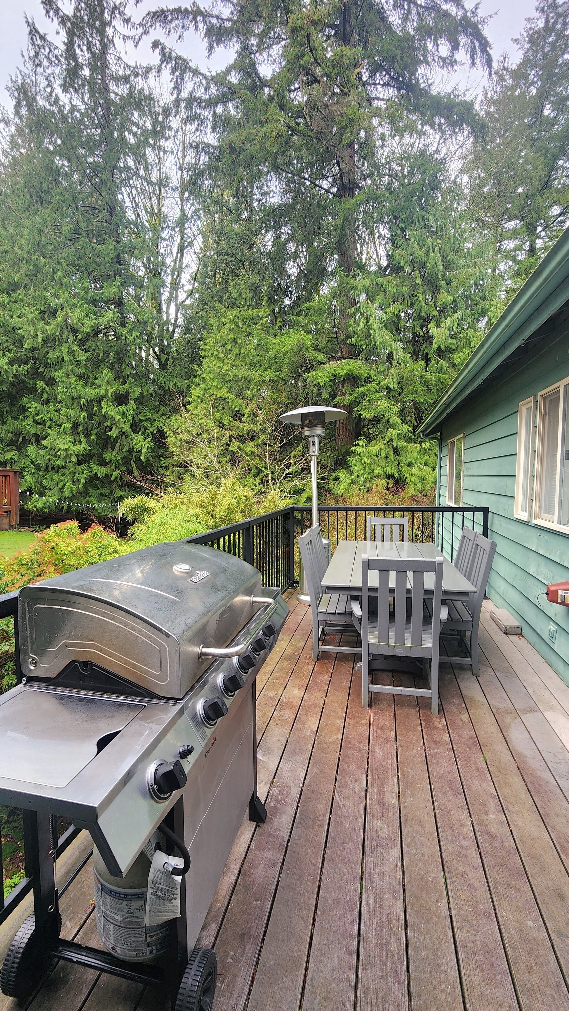 Back deck off the kitchen with a BBQ and seating for 6