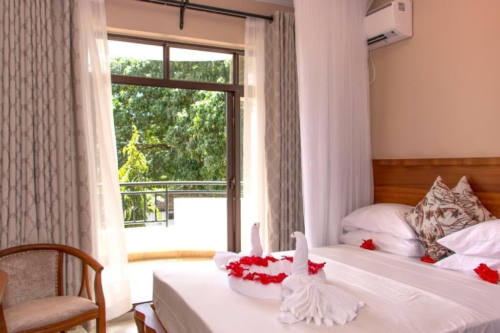 Comfort Quadruple Room | In-room safe, desk, laptop workspace, iron/ironing board