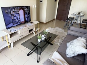 Living area - Bring your Family & Friends to Megaworld ~ 2BR#34 (Iloilo City)