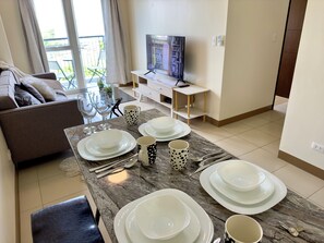 Living area - Bring your Family & Friends to Megaworld ~ 2BR#34 (Iloilo City)