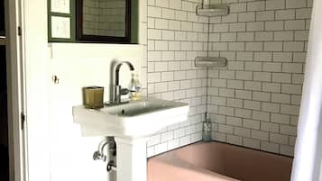 Shower, hair dryer, towels, toilet paper