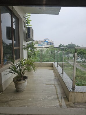 Property grounds - Cozy Deluxe room hotel with WiFi, AC in charming Gurgaon (GURGAON)