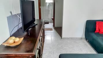 Vila | Área de estar | TV LCD 40 polegadas com canais via satélite