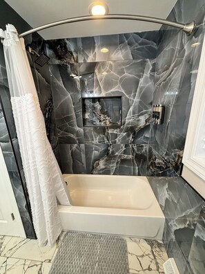 Hair dryer, towels, soap, shampoo
