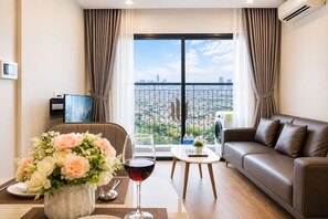 Standard Apartment, 1 Bedroom, Balcony, City View | Living area