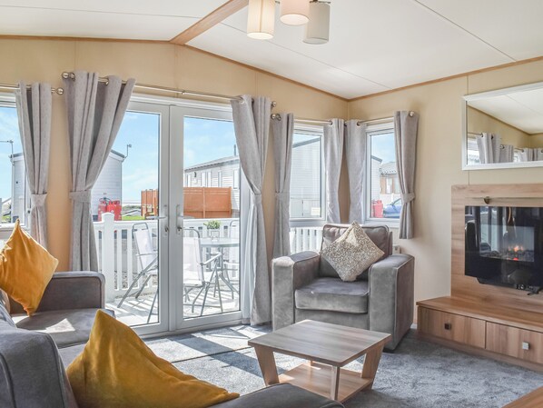 Living area - Experience the charm and comfort of Peachy, your ideal holiday home by the sea. (Heysham)