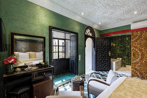 Deluxe Room | Premium bedding, minibar, individually decorated, individually furnished