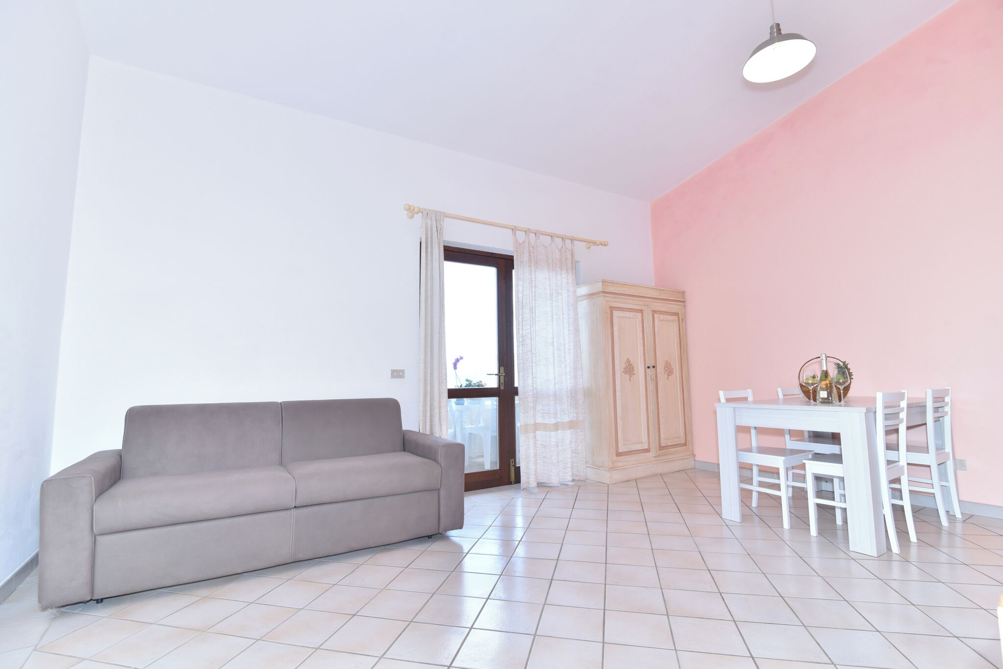 Apartment, Balcony, Sea View | Living room | Flat-screen TV