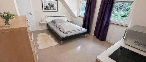 2 dormitorios, tabla de planchar con plancha, wifi gratis y ropa de cama