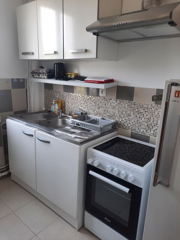 Fridge, microwave, oven, electric kettle