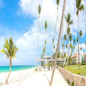 On the beach, sun-loungers, beach towels