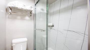 Shower, rainfall showerhead, hair dryer, towels