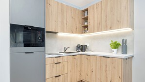 Apartment, 1 Bedroom, Balcony | Private kitchen | Coffee/tea maker, microwave, dishwasher, cookware/dishes/utensils - Apartament Parking Kołobrzeg by Renters (Kolobrzeg)