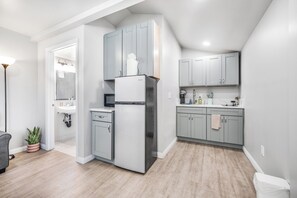 Fridge, microwave, stovetop, coffee/tea maker