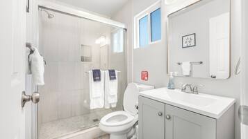 Shower, towels, soap, shampoo