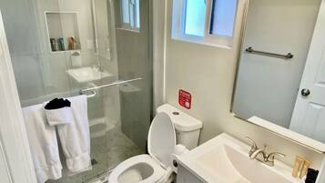 Shower, towels, soap, shampoo