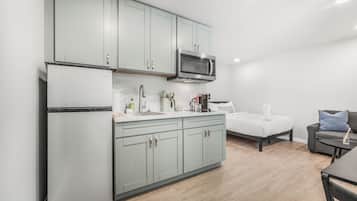 Fridge, microwave, stovetop, coffee/tea maker