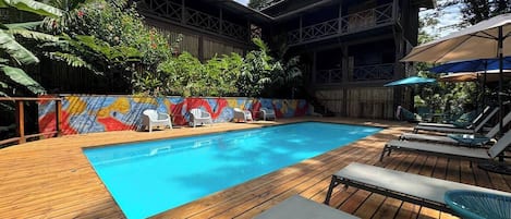 Outdoor pool, pool umbrellas, pool loungers