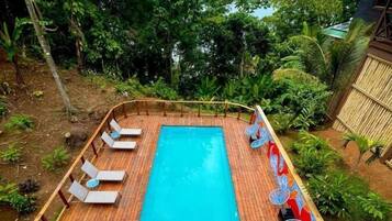 Outdoor pool, pool umbrellas, sun loungers