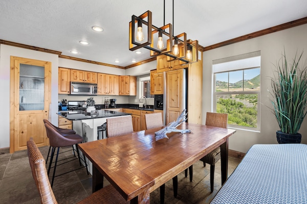 You have plenty of room and seating for your whole group at the dining room table. Enjoy gorgeous views while eating your meals or playing games.