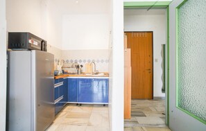 Fridge, microwave, cookware/dishes/utensils