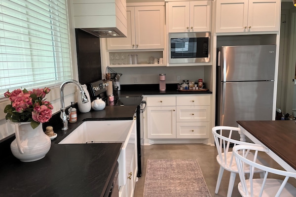 Fully supplied kitchen in the light and airy great room