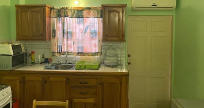 Cozy 1-bedroom studio apartment in pleasant Bon Accord with WiFi, AC