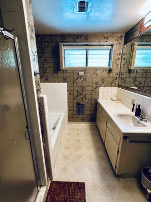 Hair dryer, towels, soap, shampoo