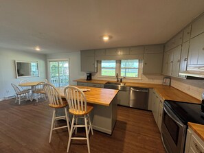 Fridge, microwave, oven, stovetop - Stunning waterfront views; 4-bedroom house directly on Intracoastal waterway! (Hubert)