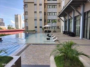 2 outdoor pools, open 8:00 AM to 6:00 PM, pool umbrellas