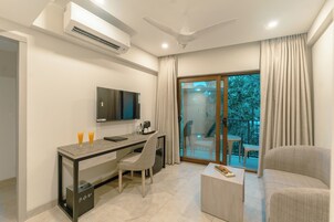 Junior Suite | Living area | 40-inch LED TV with cable channels