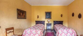 Elegant 350 sqm apartment for 6 people, located on two levels of a historic 18th century villa. The villa, with fine furnishings and frescoed galleries, will enchant you with its rooms, where history and comfort blend to give you an unforgettable experie