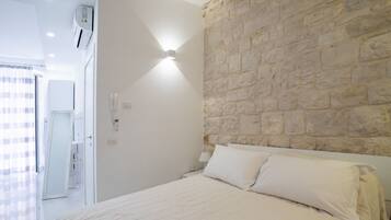 1 chambre, fer et planche Ă repasser, Wi-Fi, draps fournis