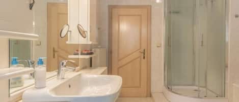Hair dryer, towels, soap, toilet paper